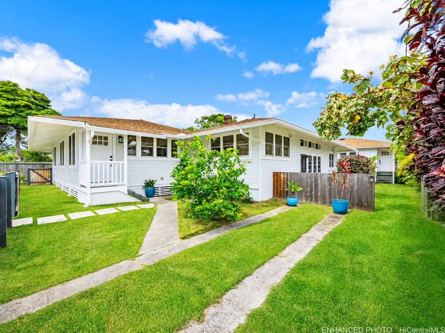 Welcome to 244 Awakea Rd in Kailua Estates! Grass is slightly enhanced for visual purposes.