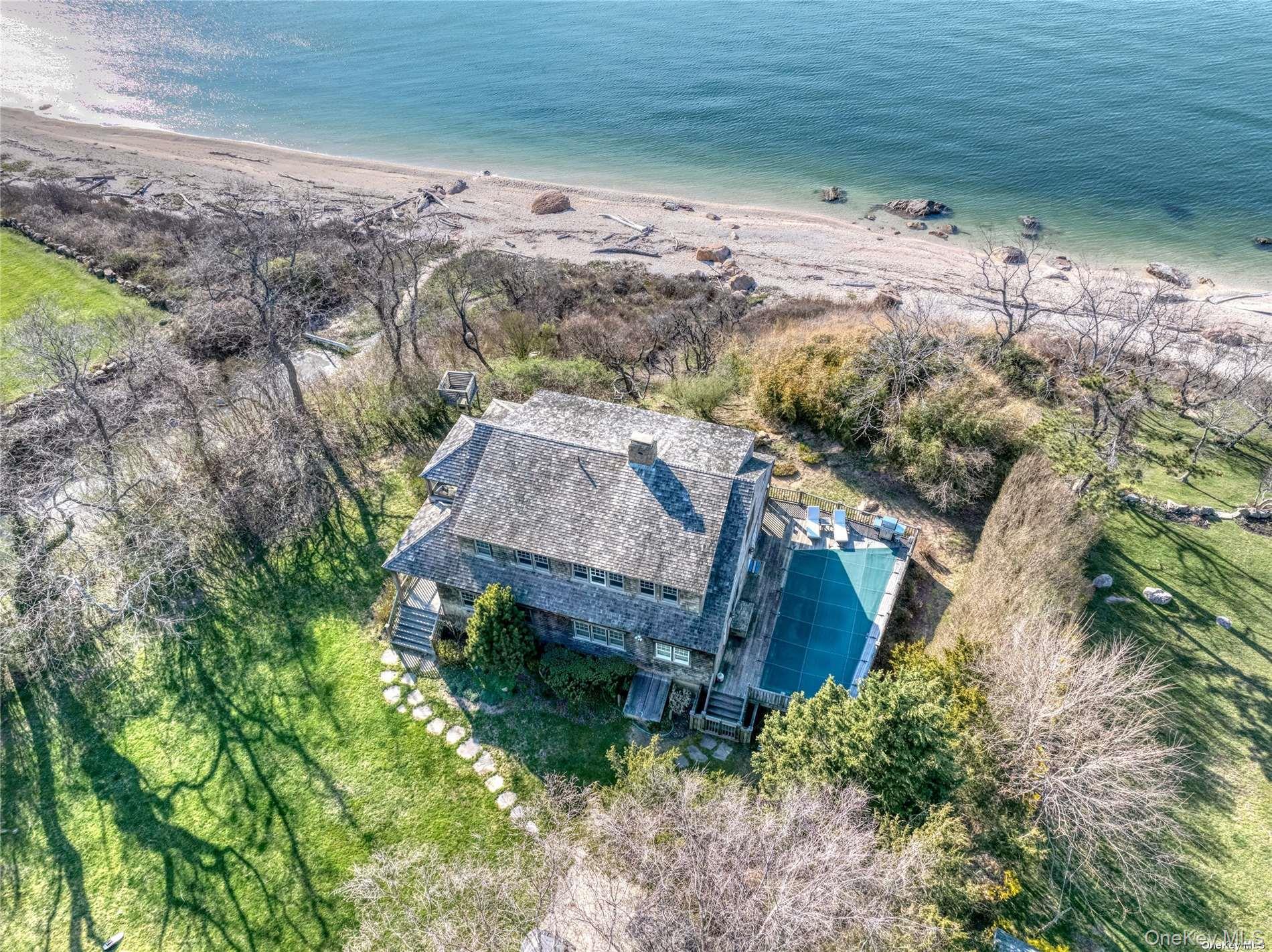 2100 Youngs Road Orient, NY 11957 - Photo 19 of 22 a view of a house with a yard