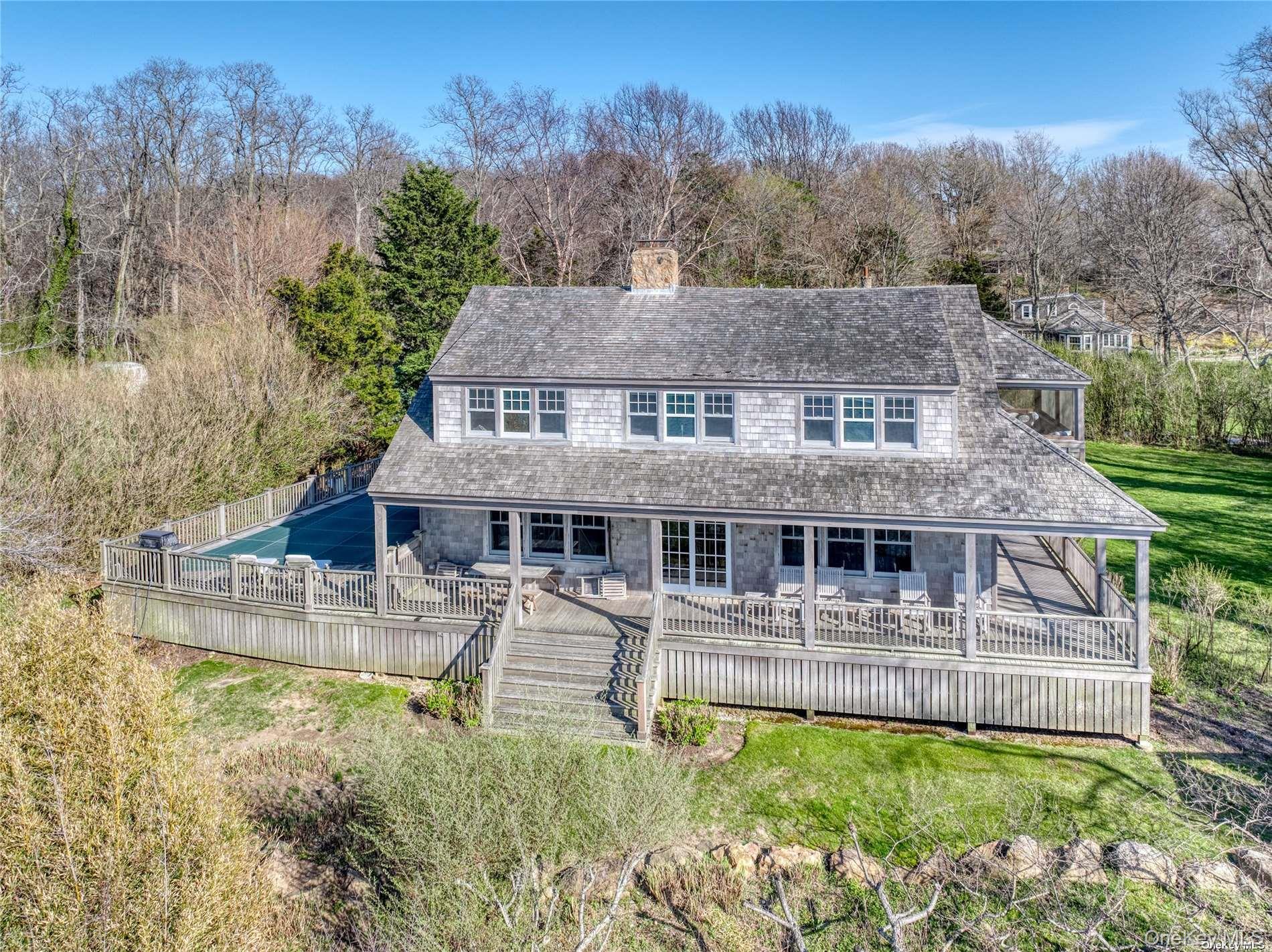 2100 Youngs Road Orient, NY 11957 - Photo 22 of 22 a aerial view of a house with swimming pool yard and outdoor seating