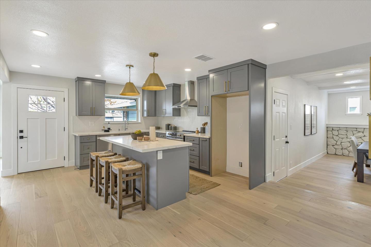 2860 Encinitas Court San Jose, CA 95132 - Photo 14 of 45 a kitchen with stainless steel appliances granite countertop a refrigerator a sink dishwasher and a stove with wooden floor