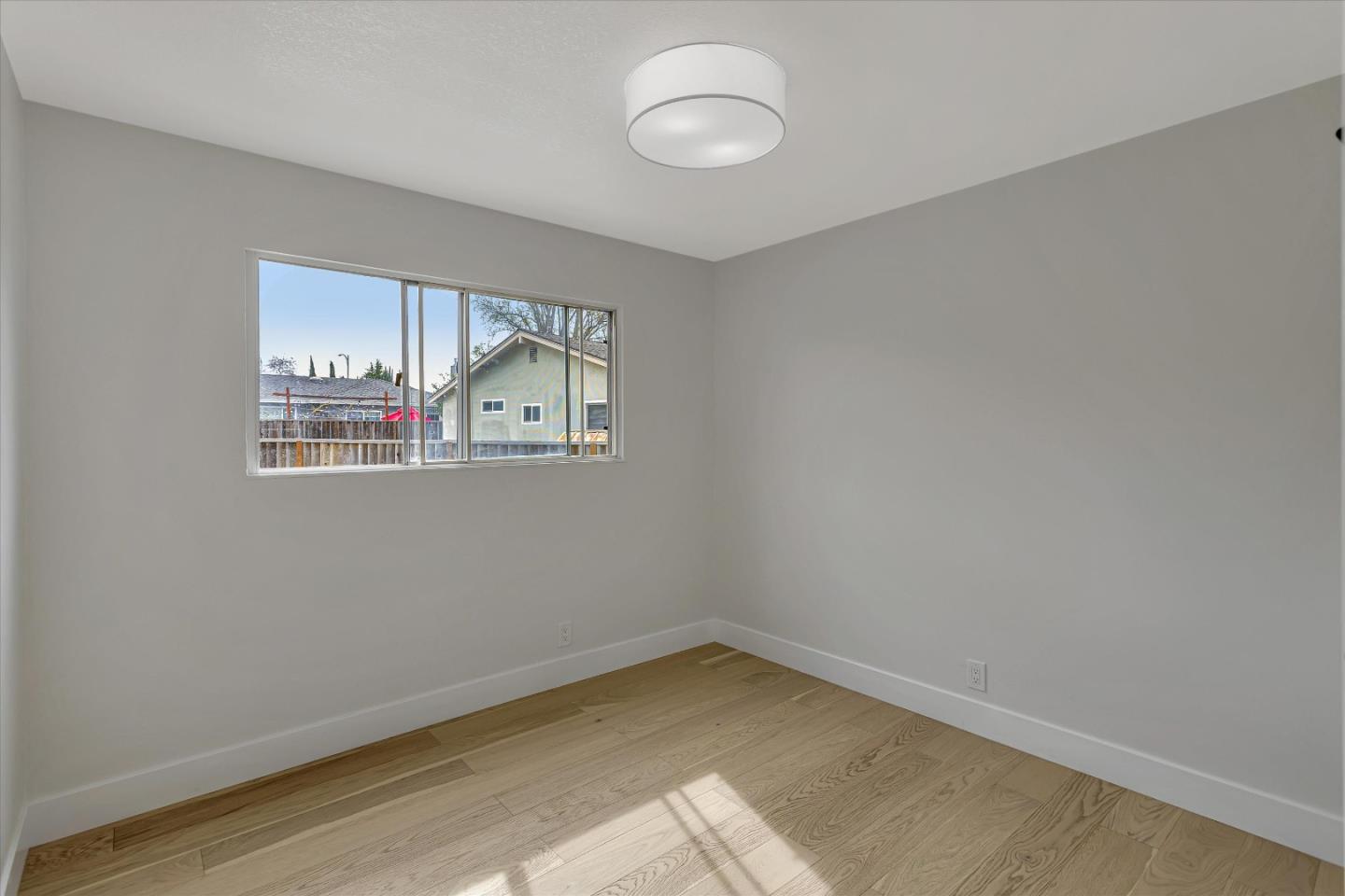 2860 Encinitas Court San Jose, CA 95132 - Photo 26 of 45 a view of an empty room with a window