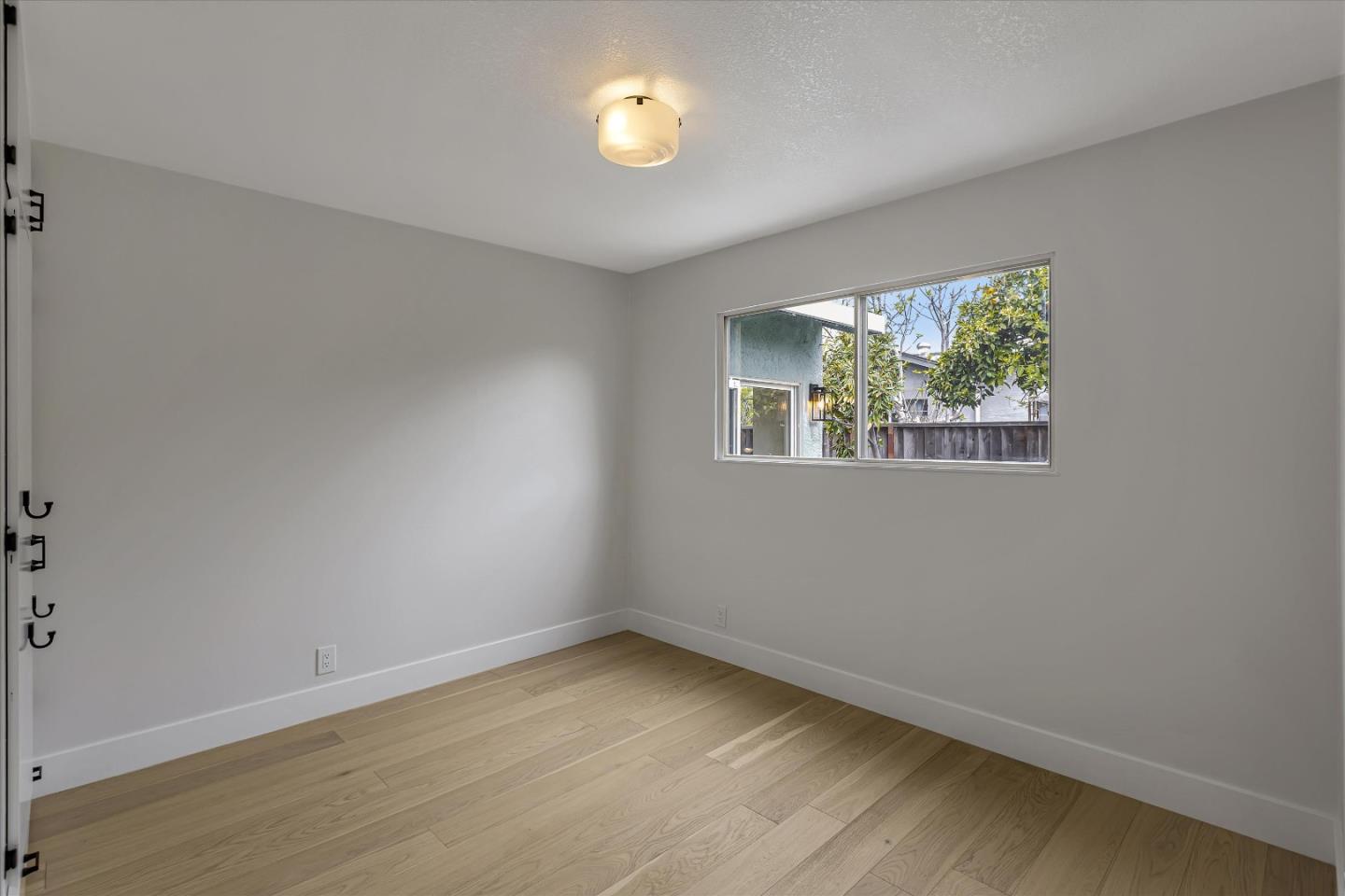 2860 Encinitas Court San Jose, CA 95132 - Photo 28 of 45 an empty room with a window