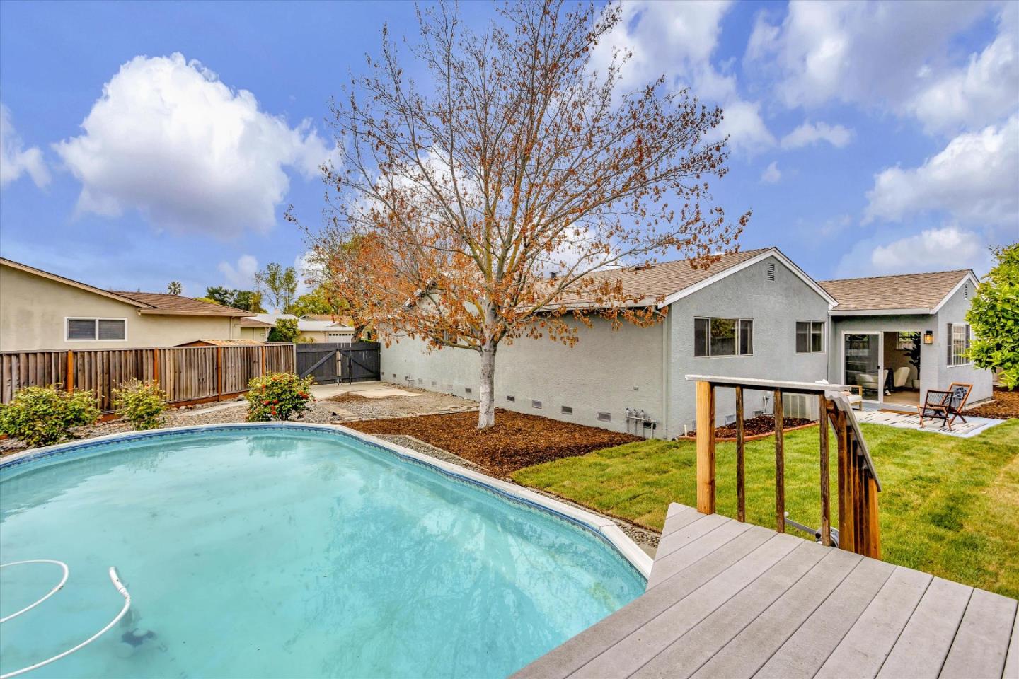 2860 Encinitas Court San Jose, CA 95132 - Photo 44 of 45 a view of a house with swimming pool and sitting area