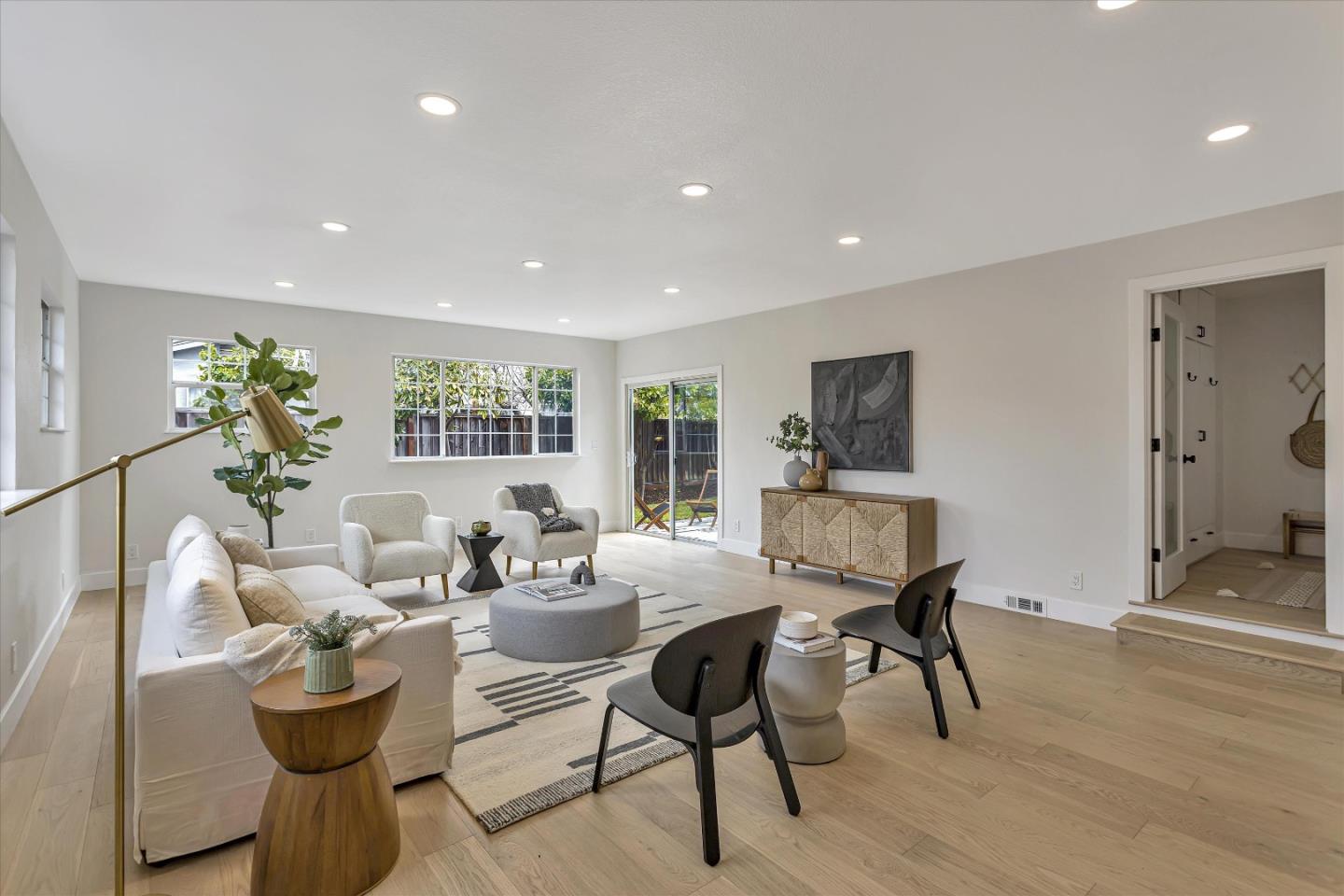 2860 Encinitas Court San Jose, CA 95132 - Photo 7 of 45 a living room with fireplace furniture and a wooden floor