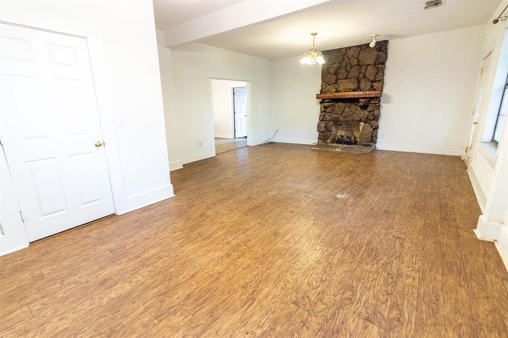 801 South Sutton Street Mabank, TX 75147 - Photo 11 of 26 a view of a storage & utility room with closet