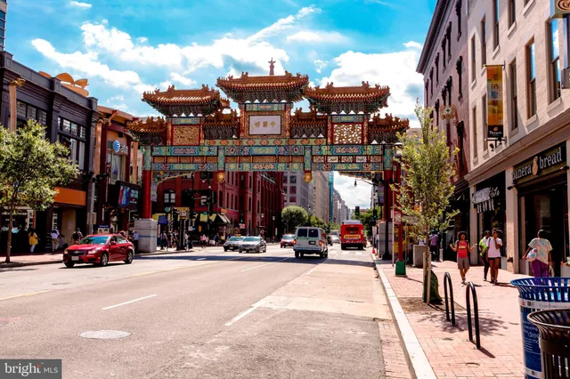a view of buildings with cars