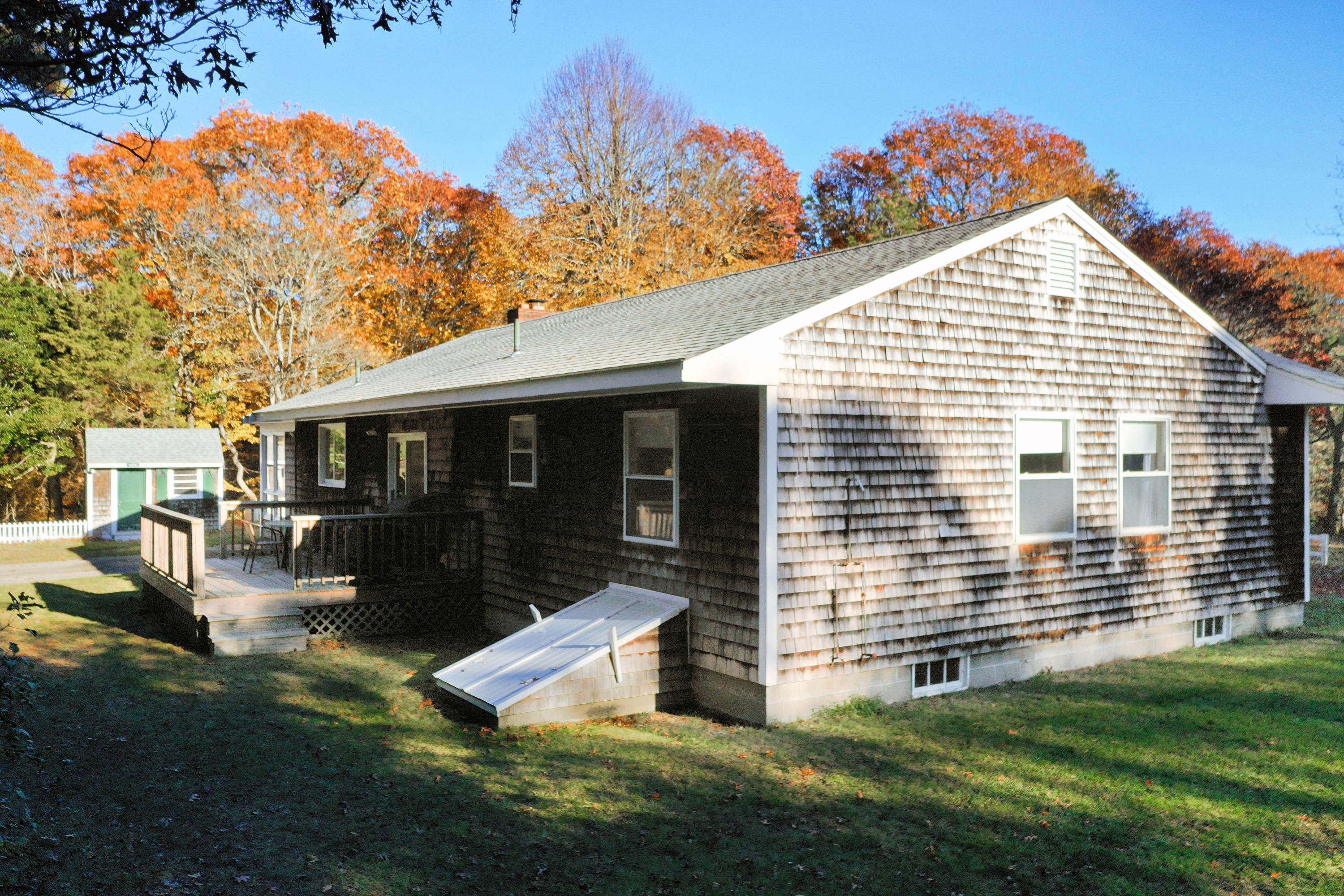 169-173 Old Post Road Centerville, MA 02632 - Photo 12 of 50 a view of a house with a yard