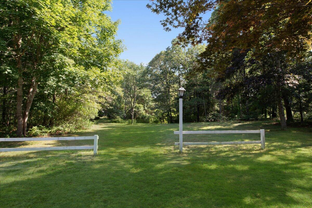 169-173 Old Post Road Centerville, MA 02632 - Photo 26 of 50 a view of a fountain in front of a house