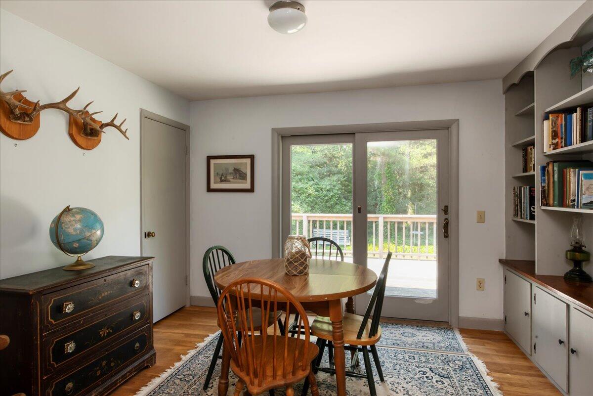 169-173 Old Post Road Centerville, MA 02632 - Photo 28 of 50 a view of a dining room with furniture and a window