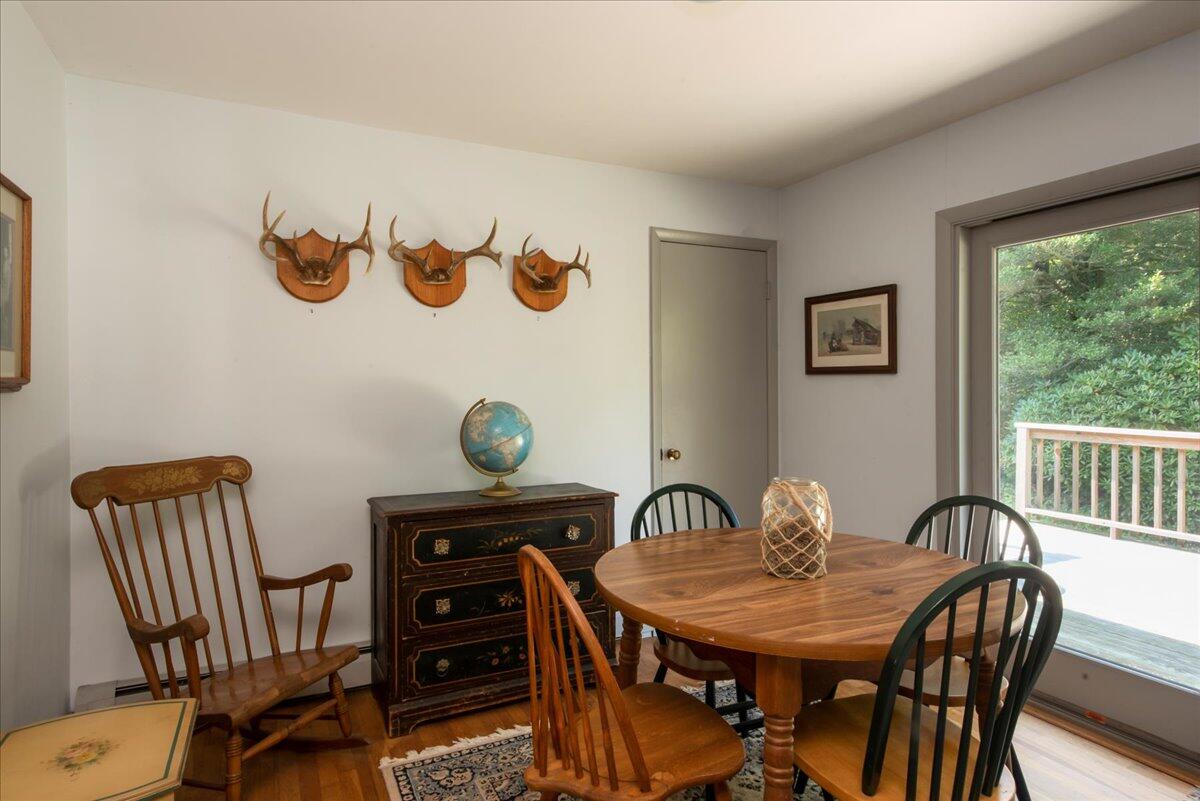 169-173 Old Post Road Centerville, MA 02632 - Photo 29 of 50 a view of a dining room with furniture window and outside view