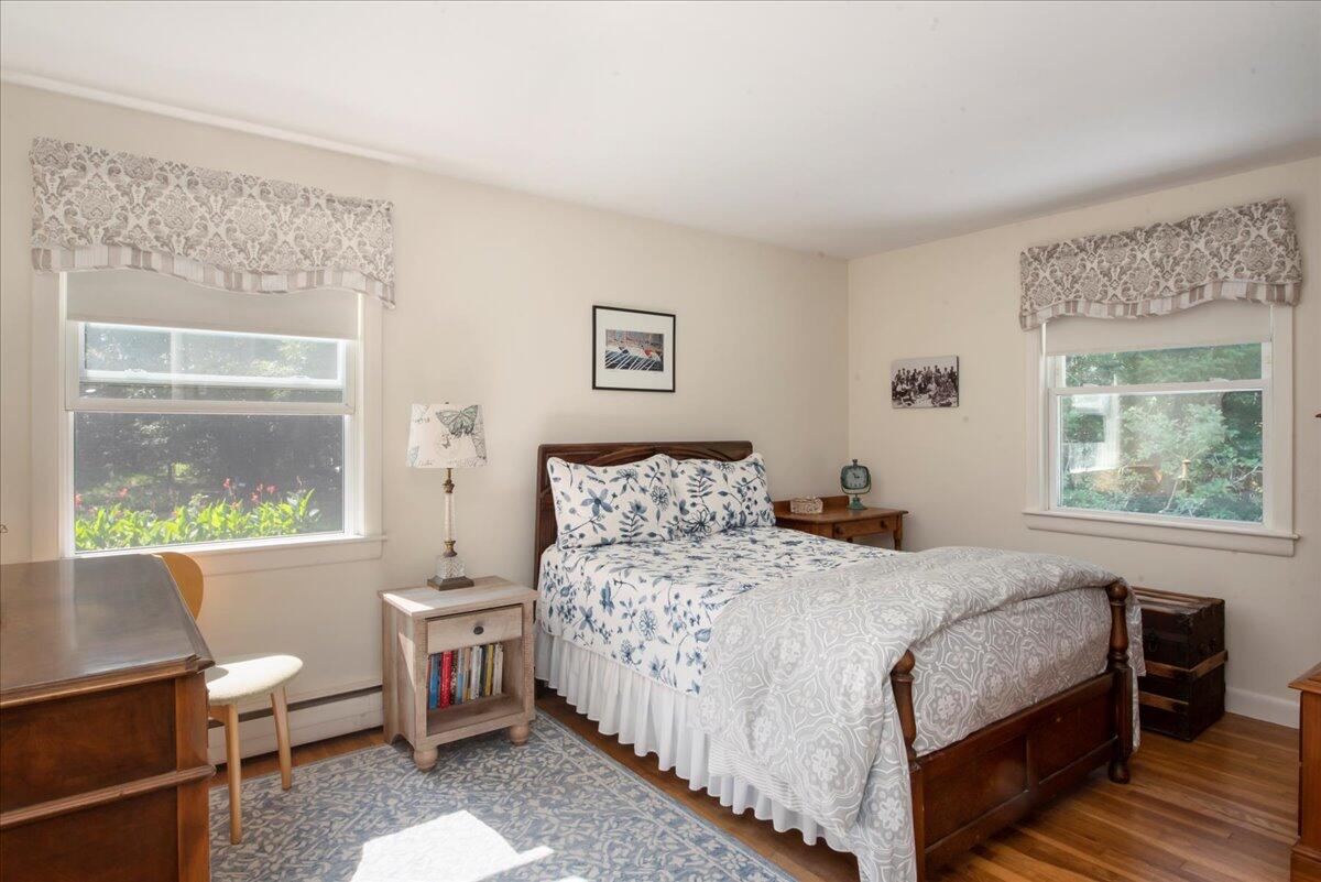 169-173 Old Post Road Centerville, MA 02632 - Photo 35 of 50 a bedroom with a bed and a window