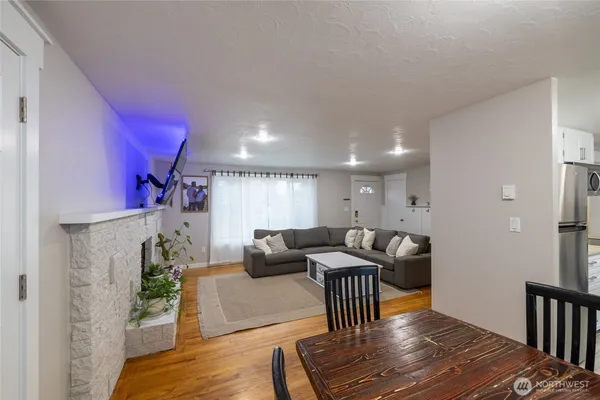 a living room with furniture and a table