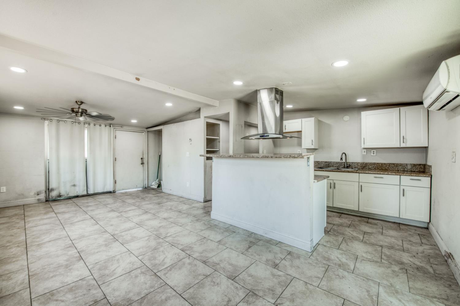 2326 East Hampton Way Fresno, CA 93726 - Photo 6 of 22 a view of a kitchen with a sink