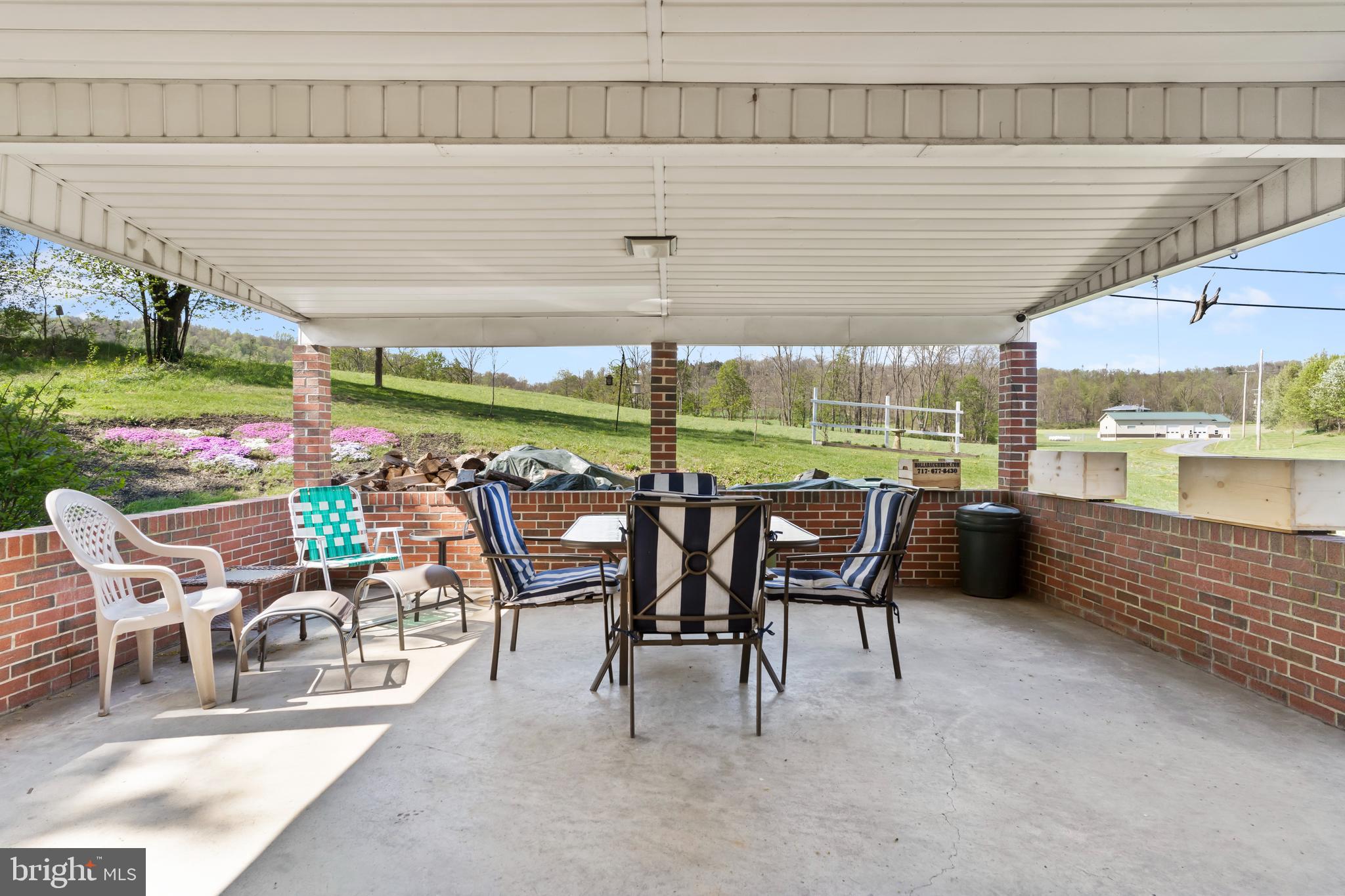 206 East Main Street New Bloomfield, PA 17068 - Photo 12 of 38 Amazing covered back porch for alfresco dining
