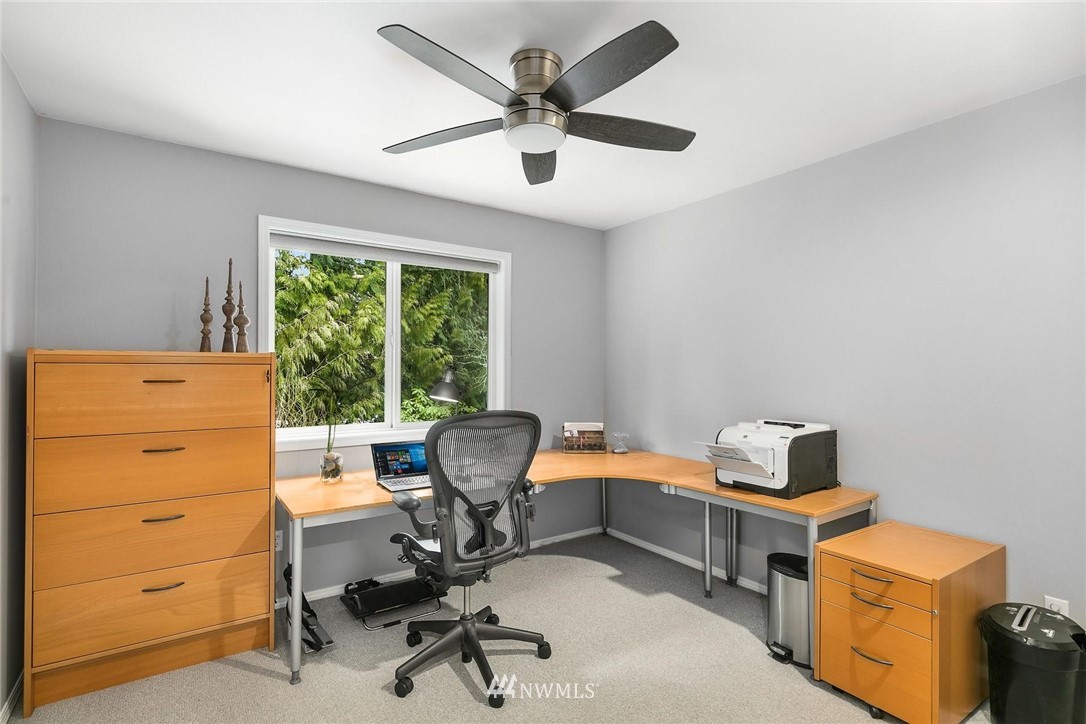 23809 Southeast 243rd Street Maple Valley, WA 98038 - Photo 24 of 40 a view of a workspace with furniture and a window