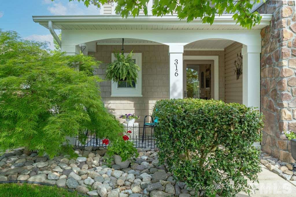 316 Steel Hopper Way Garner, NC 27529 - Photo 2 of 19 a front view of a house with plants