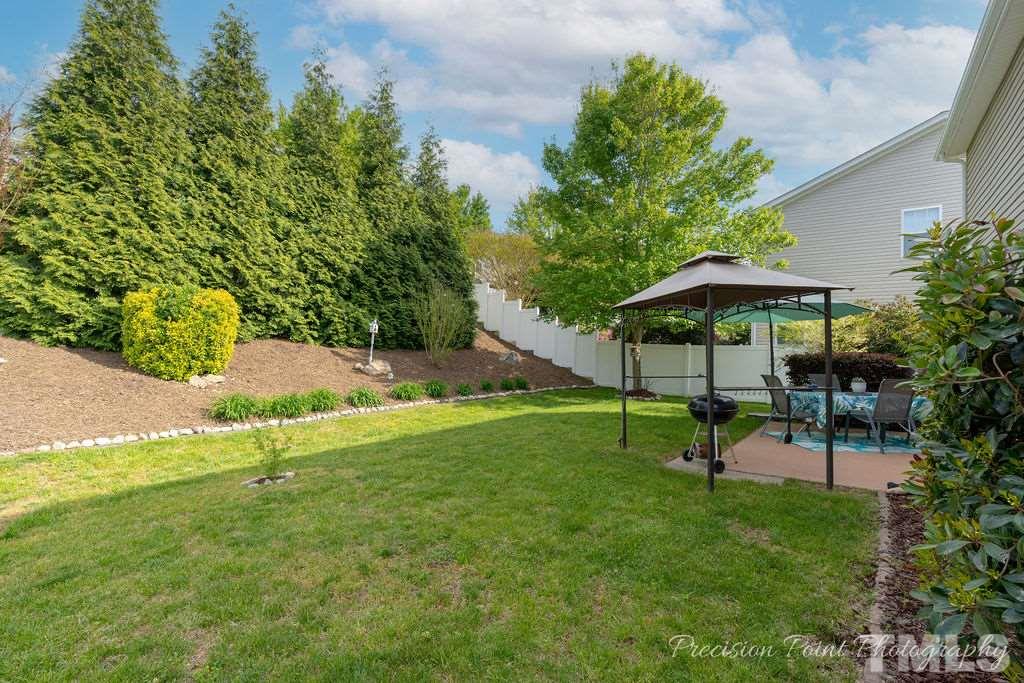 316 Steel Hopper Way Garner, NC 27529 - Photo 18 of 19 a view of park with bench and trees