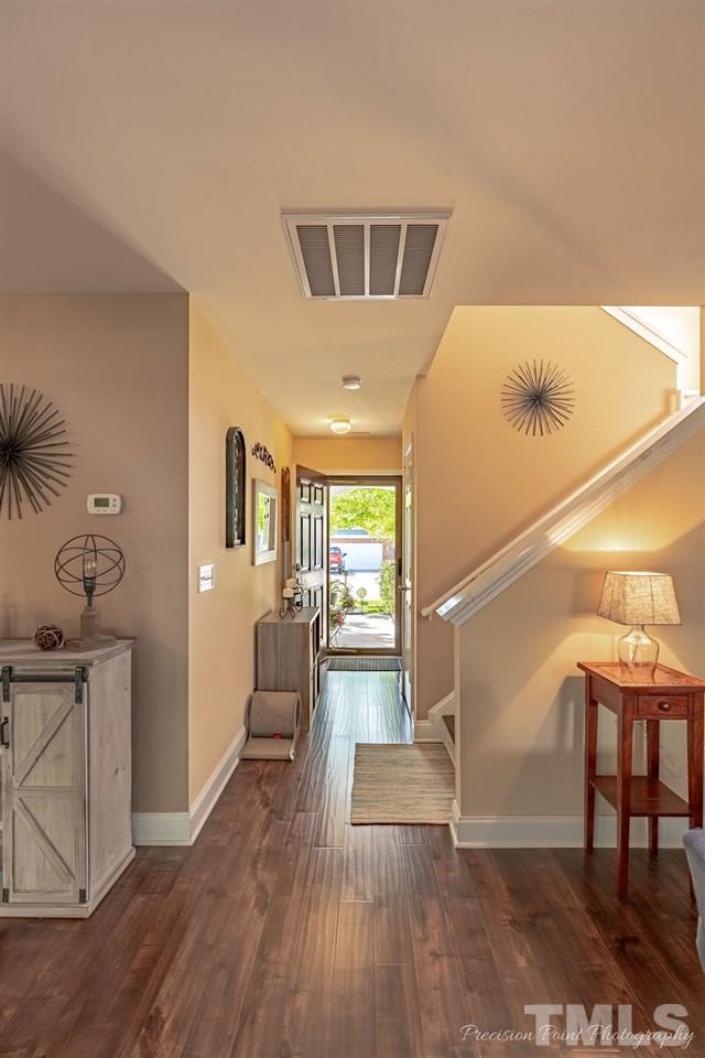 316 Steel Hopper Way Garner, NC 27529 - Photo 7 of 19 a living room with furniture and a wooden floor