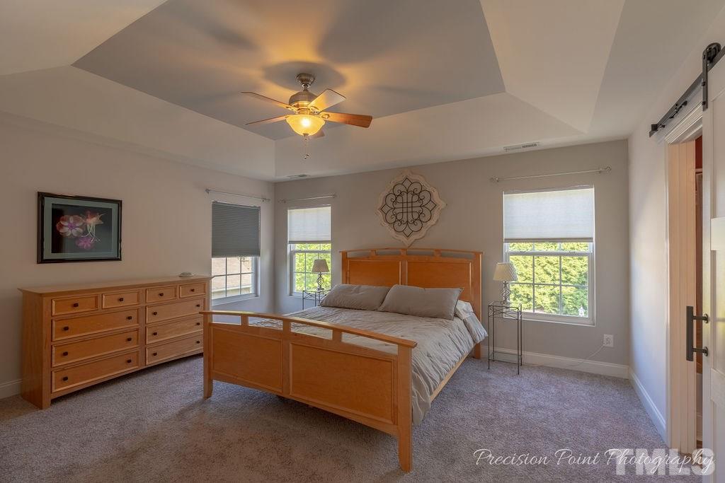 316 Steel Hopper Way Garner, NC 27529 - Photo 10 of 19 a living room with furniture and a window