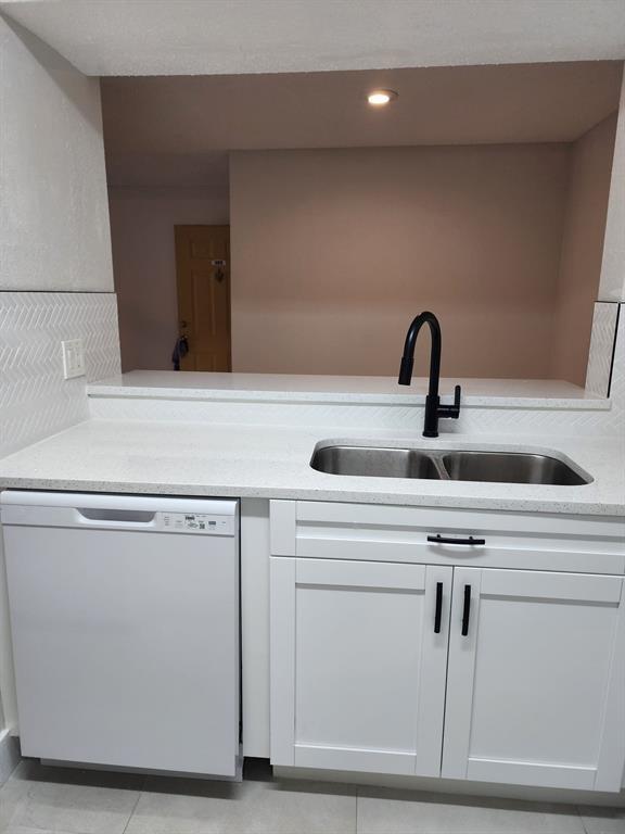 1229 Southwest 46th Avenue, Unit 405 Pompano Beach, FL 33069 - Photo 22 of 26 a close view of sink and tap