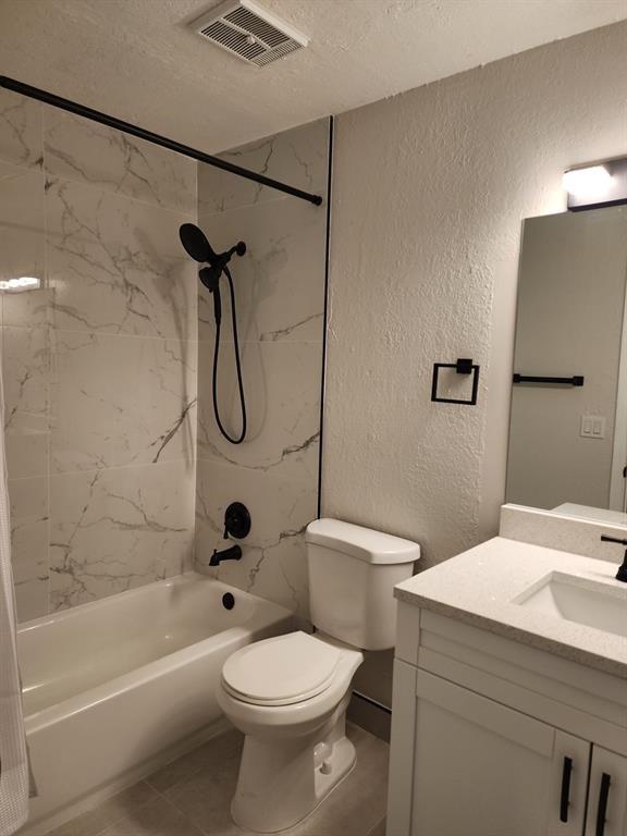 1229 Southwest 46th Avenue, Unit 405 Pompano Beach, FL 33069 - Photo 8 of 26 a bathroom with a toilet sink and shower
