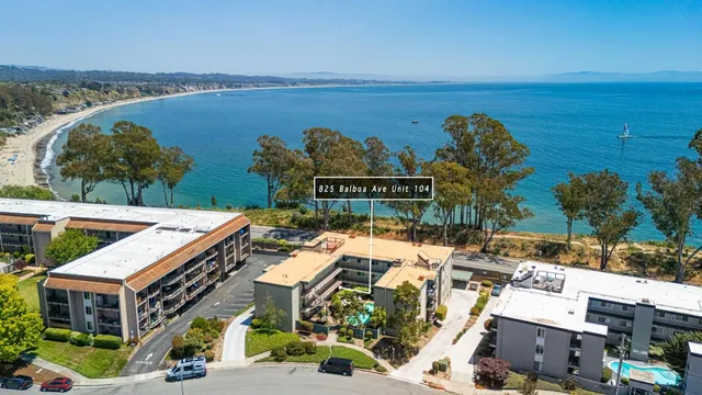 a view of a city with an ocean view