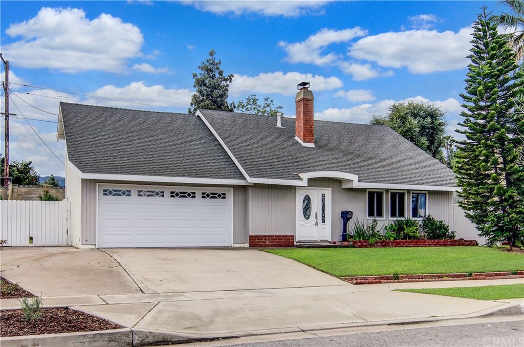 246 East Mission Road Corona, CA 92879 - Photo 1 of 1 Nice street appeal with lush lawn and mature Star Pine.