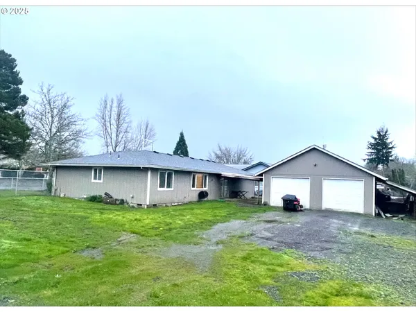 a front view of house with garden