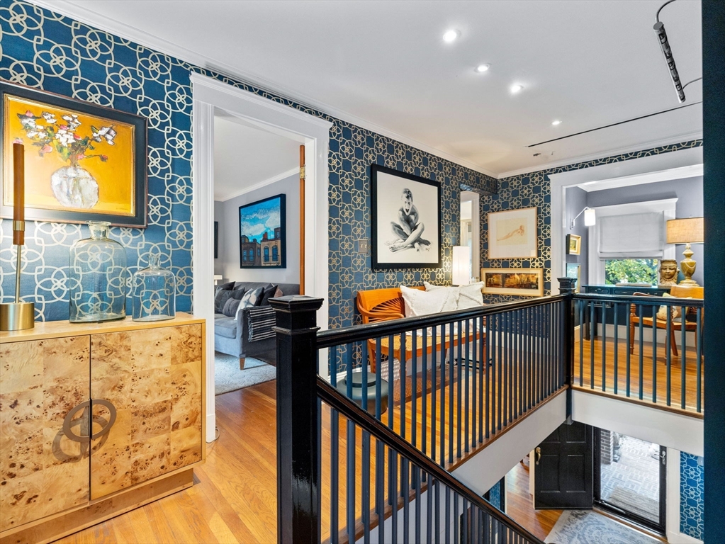 81 Arborway Boston, MA 02130 - Photo 15 of 29 a view of a porch with wooden floor and windows