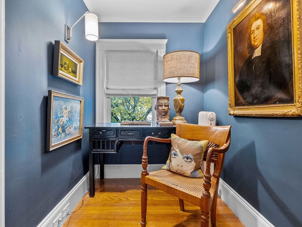 81 Arborway Boston, MA 02130 - Photo 16 of 29 a living room with furniture and a window