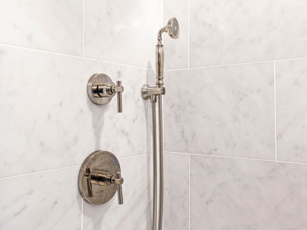 81 Arborway Boston, MA 02130 - Photo 18 of 29 a bathroom with a shower