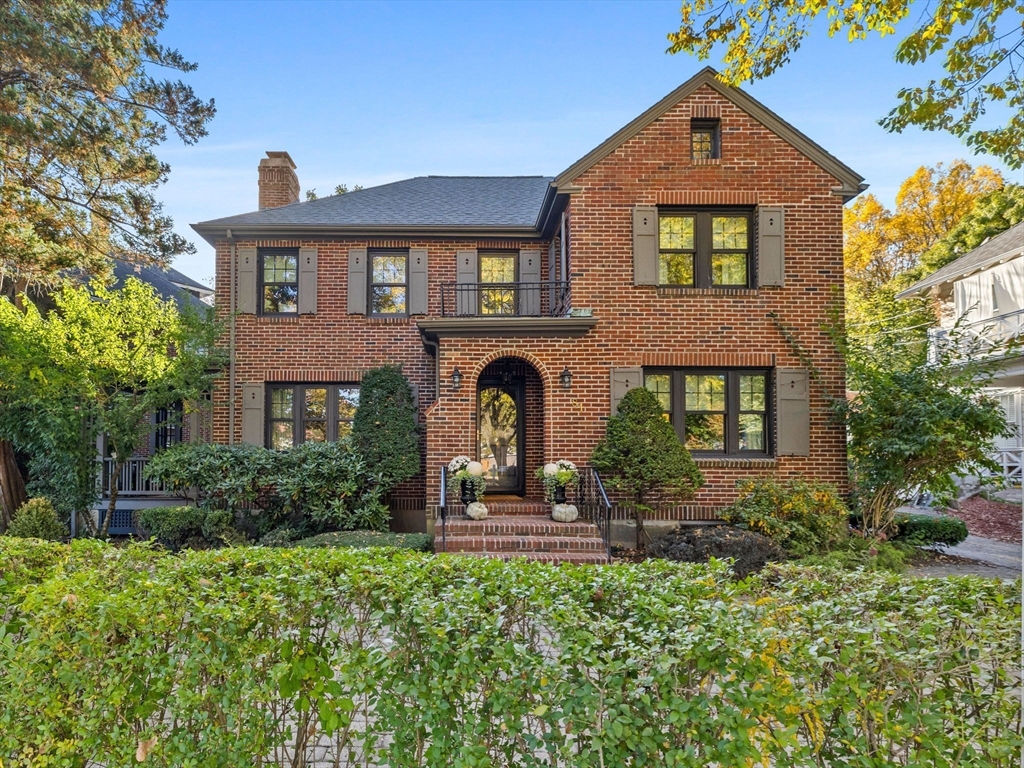 81 Arborway Boston, MA 02130 - Photo 2 of 29 a front view of a house with garden