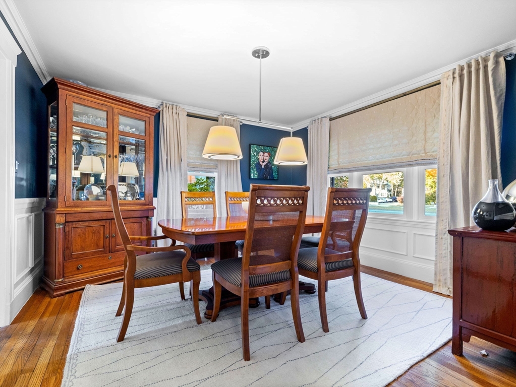 81 Arborway Boston, MA 02130 - Photo 6 of 29 a view of a dining room with furniture window and wooden floor