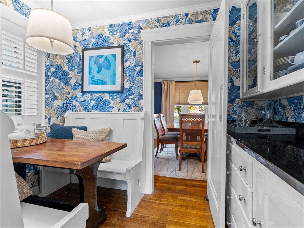 81 Arborway Boston, MA 02130 - Photo 8 of 29 a view of a dining room with furniture window and wooden floor