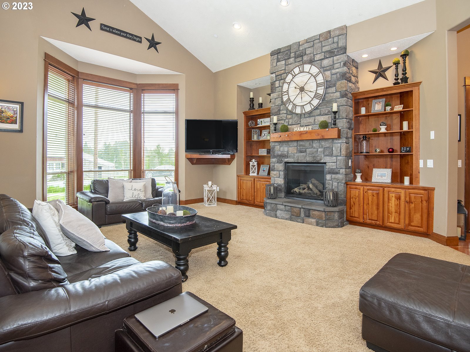 30316 Southeast Lusted Road Gresham, OR 97080 - Photo 3 of 30 a living room with furniture fireplace and flat screen tv