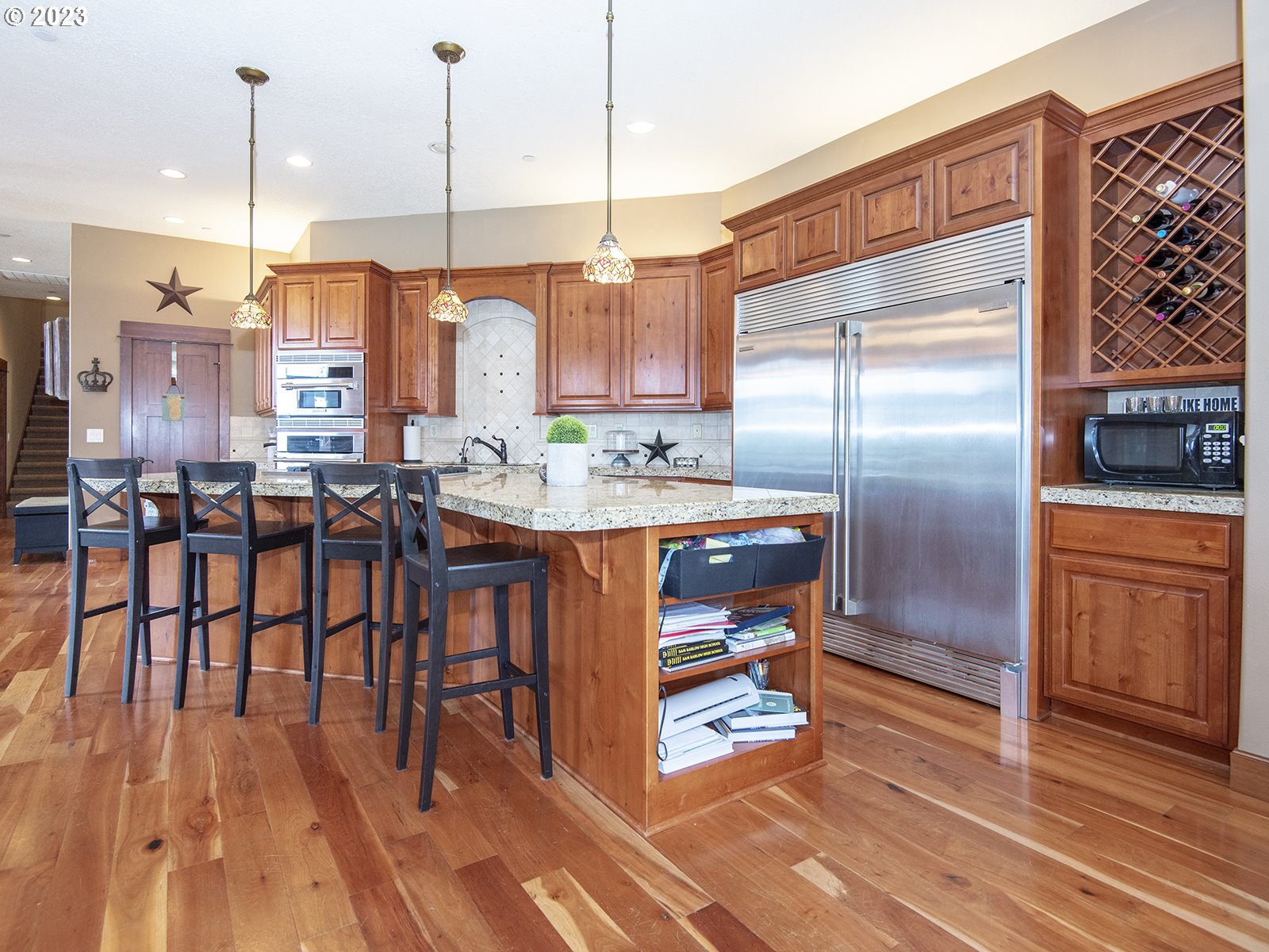 30316 Southeast Lusted Road Gresham, OR 97080 - Photo 8 of 30 a kitchen with stainless steel appliances granite countertop a refrigerator a stove and a wooden floors