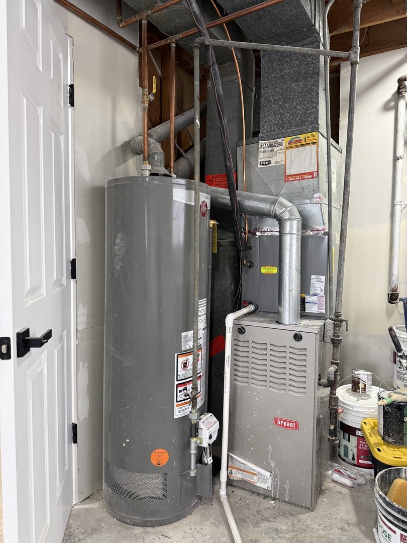 306 West 111th Street Chicago, IL 60628 - Photo 18 of 22 a utility room with dryer and washer