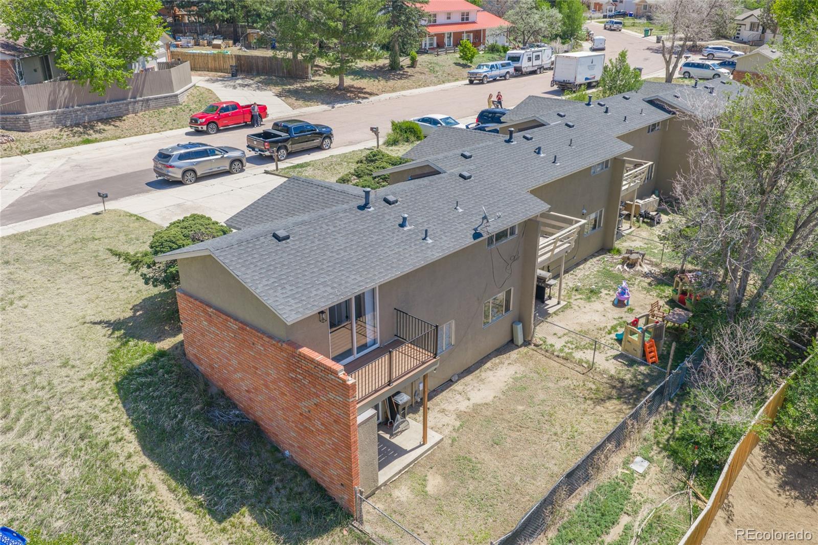 6727 Dale Road Colorado Springs, CO 80915 - Photo 3 of 18 an aerial view of a house with a yard