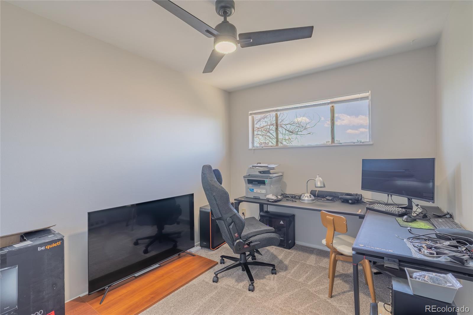 6727 Dale Road Colorado Springs, CO 80915 - Photo 9 of 18 a view of a workspace with furniture