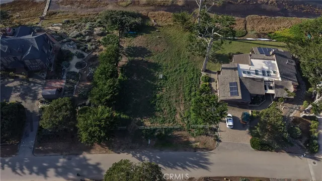 an aerial view of residential house with outdoor space