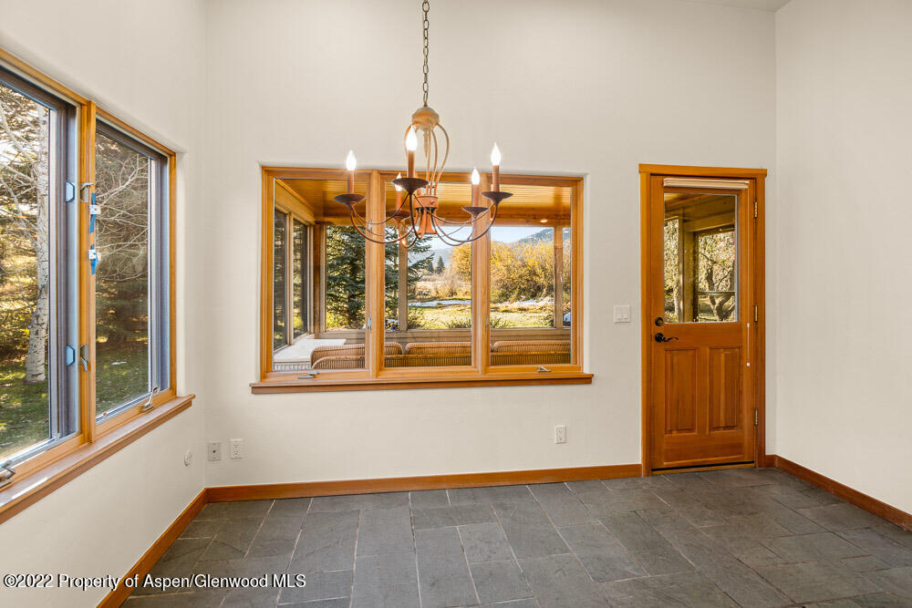 98 Lewis Lane Basalt, CO 81621 - Photo 11 of 31 a view of an empty room with a window