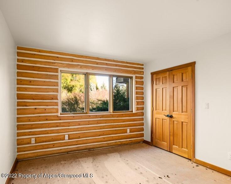 98 Lewis Lane Basalt, CO 81621 - Photo 17 of 31 a view of a livingroom with an empty space and a window