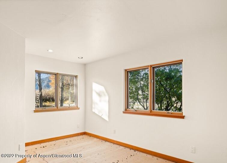 98 Lewis Lane Basalt, CO 81621 - Photo 18 of 31 a view of an empty room with a window