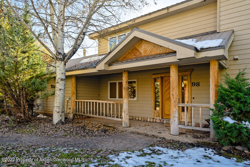 98 Lewis Lane Basalt, CO 81621 - Photo 27 of 31 a front view of a house with garden