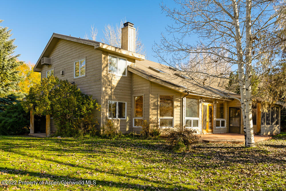 98 Lewis Lane Basalt, CO 81621 - Photo 29 of 31 a front view of a house with a yard