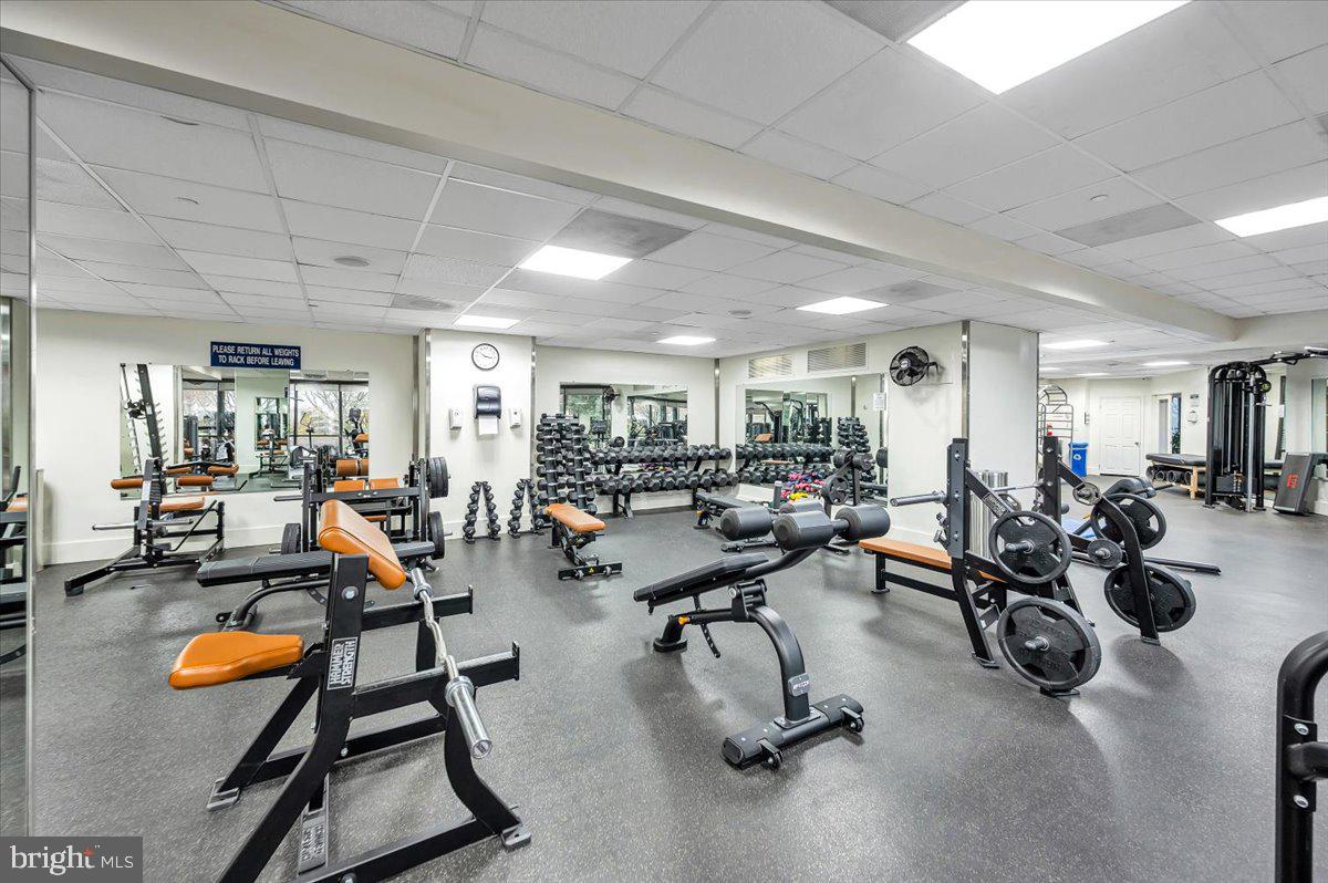 5225 Pooks Hill Road, Unit 616N Bethesda, MD 20814 - Photo 45 of 62 a gym room with lots of gym equipment