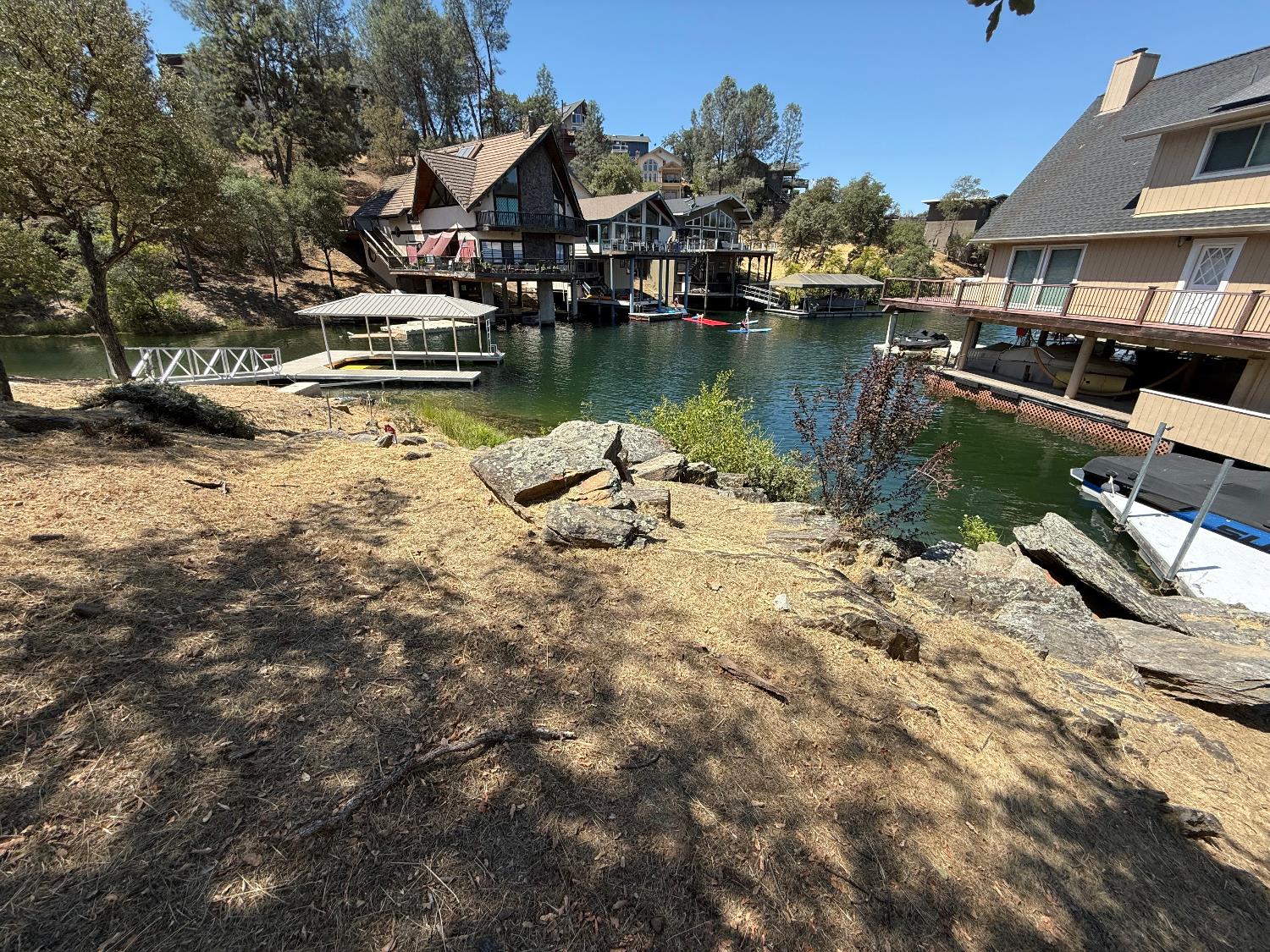 554 Sunrise Road Copperopolis, CA 95228 - Photo 4 of 20 a view of a lake with houses