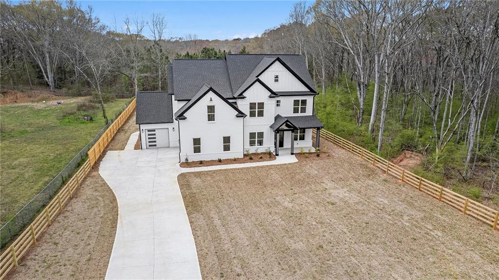 1970 Bold Springs Road Monroe, GA 30656 - Photo 1 of 1 a view of a house with backyard and trees
