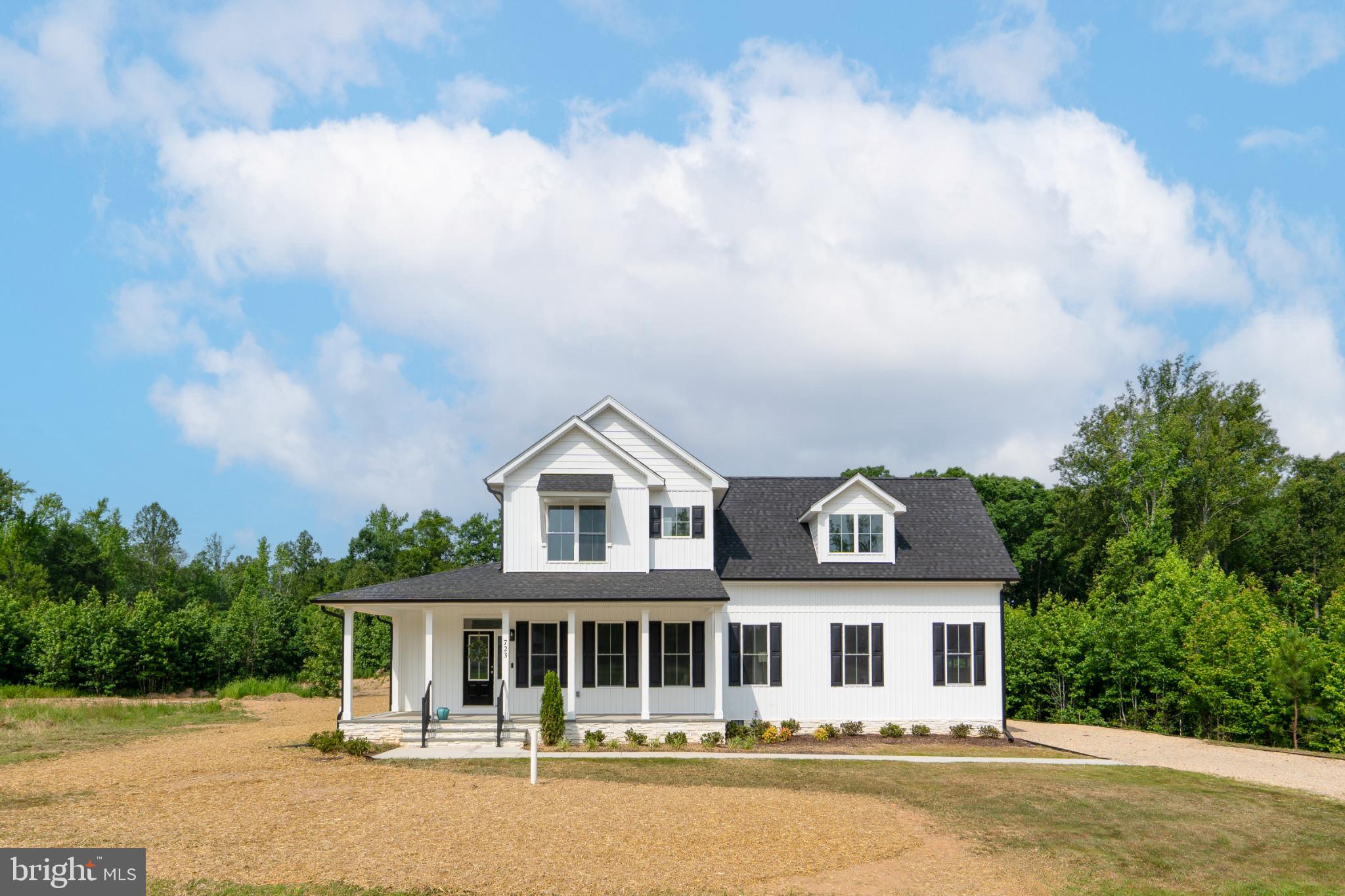 723 Rainbow Ridge Bumpass, VA 23024 - Photo 2 of 60 a front view of a house with yard and balcony