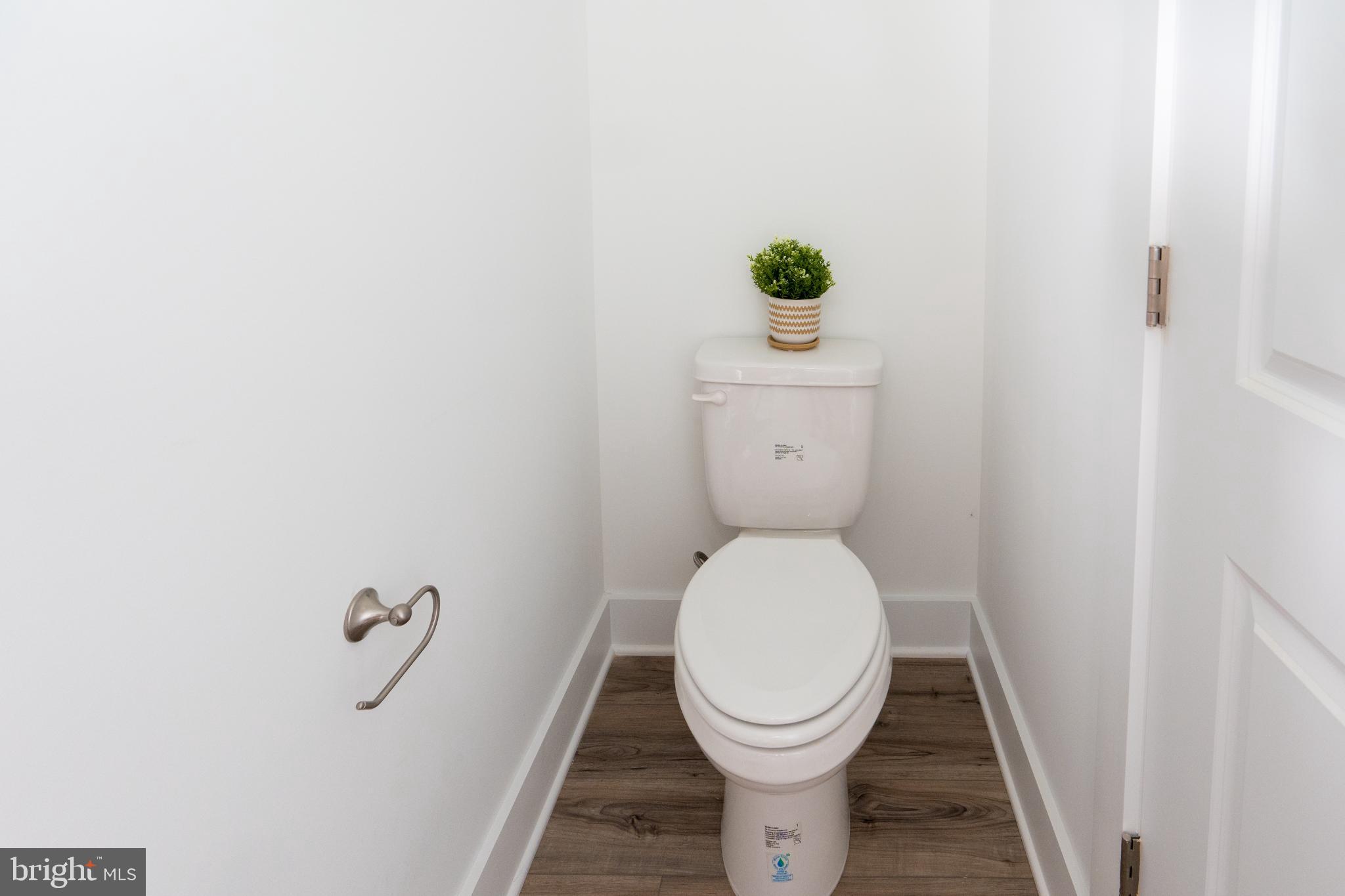 723 Rainbow Ridge Bumpass, VA 23024 - Photo 28 of 60 a bathroom with a toilet and a sink